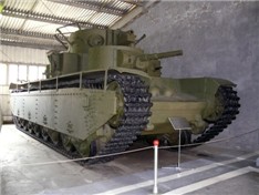 Советский тяжелый танк T35. Был самым сильным по вооружению и единственным в мире пятибашенным танком. экипаж - целая футбольная команда - 11 человек